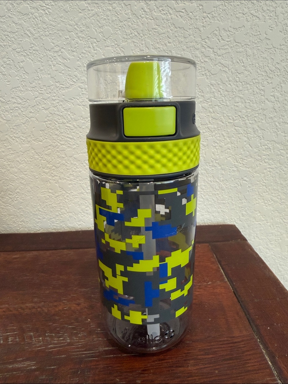 Clear Patterned Water Bottle with Neon Green Accent